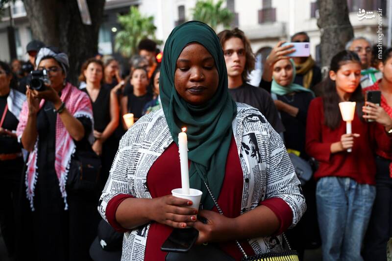 شهروندان آفریقای جنوبی در شهر کیپ تاون برای خبرنگاران فلسطینی که در غزه...